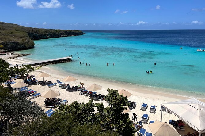 10 Seats Private Van Beach hopping (AC) - Playa Porto Marie and its famous pigs