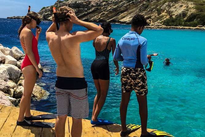Guided Snorkel Tour at the Best Reef from shore on Curacao - Blue Bay Beach - Following the Guide over Blue Bay’s Coral Reef