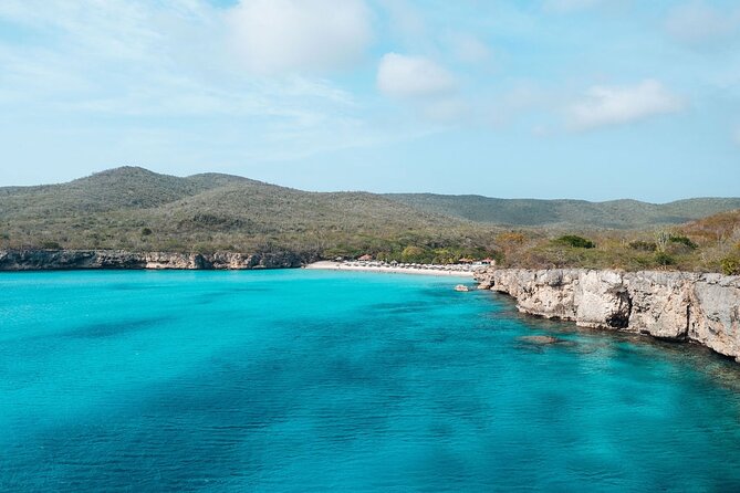 West Coast Full-Day Tour with Beaches, BBQ and Blue Room - Kokomo Beach: snorkeling from the catamaran